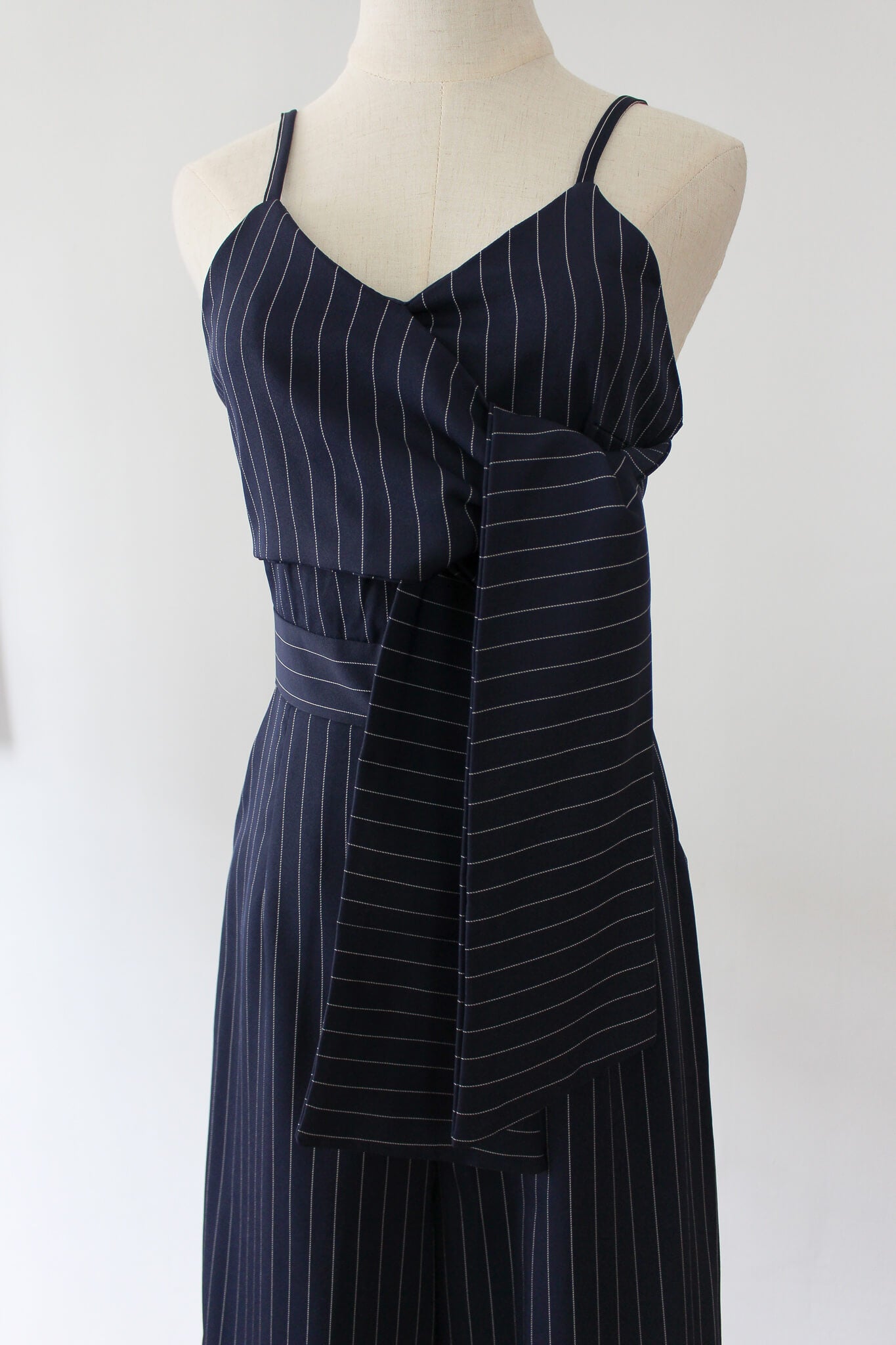 Striped jumpsuit with front twist. Perfect workwear or brunch outfit