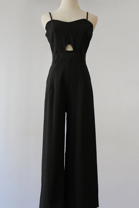 Belted Jumpsuit with small cut-out. Soft thin material perfect for summer. 