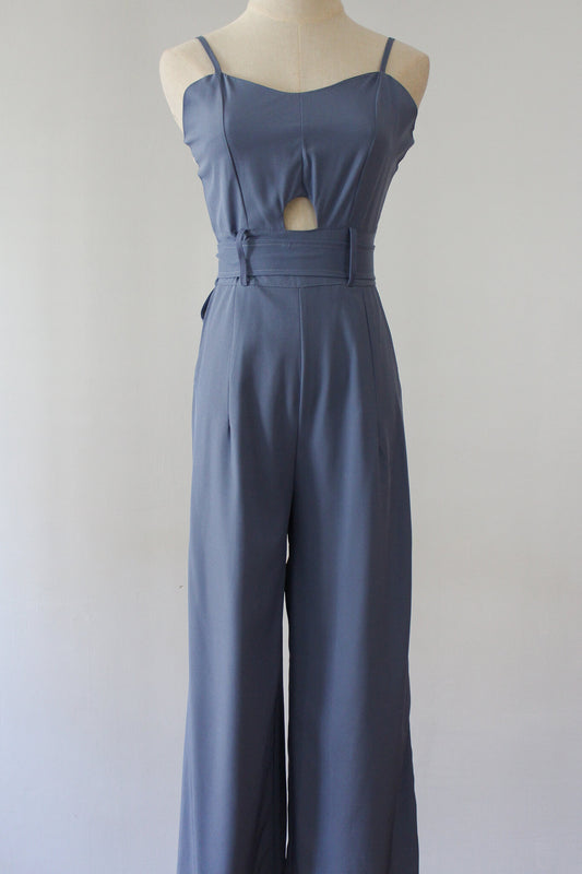 Belted Jumpsuit with small cut-out. Soft thin material perfect for summer. 